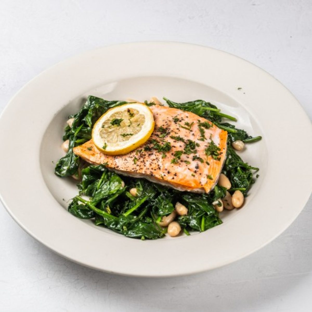 Salmon or Flounder Over Spinach and Beans